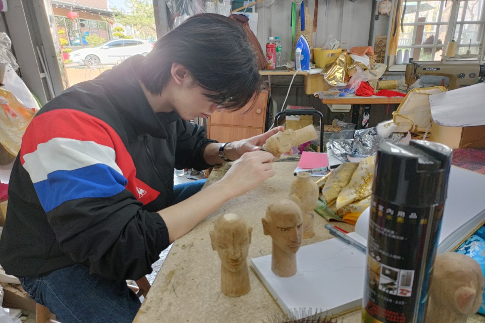 Glove puppet carving: Step 2 – carving the facial features.